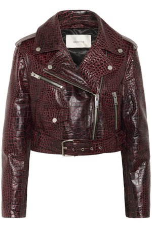 Burgundy cropped leather jacket with crocodile texture, silver zippers, an asymmetrical front, and a belted waist. Features snap buttons.