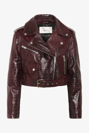 Burgundy cropped leather jacket with crocodile texture, silver zippers, an asymmetrical front, and a belted waist. Features snap buttons.