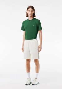 Lacoste INTERLOCK CONTRAST - Pantalones deportivos - flour