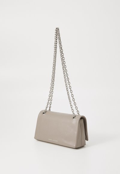 Gray leather handbag with a structured design, featuring a silver chain strap and logo on the front. Smooth texture with rounded edges.