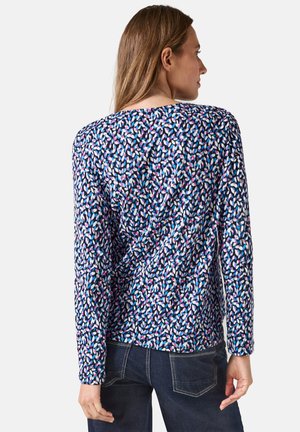 Chemise à manches longues en bleu marine avec un motif abstrait multicolore, dotée d'un col rond et d'une coupe décontractée. Fabriquée en tissu doux en mélange de coton.