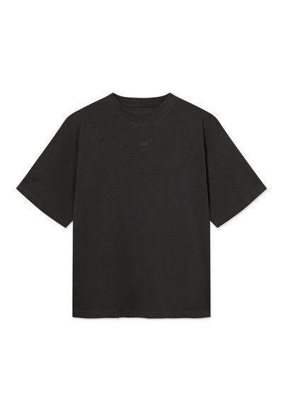 T-shirt noir oversized à manches courtes avec un col rond et un logo "WW" discret centré sous le col.