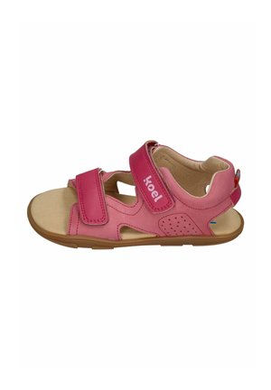 Pink children's sandal with two adjustable straps and a tan sole, designed for comfort and breathability.