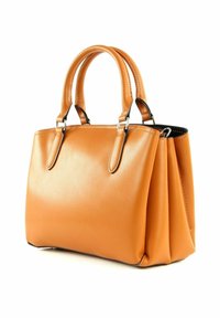 Sac à main en cuir marron tan avec deux poignées courtes, forme structurée, intérieur noir contrasté et détails de surpiqûres subtils.