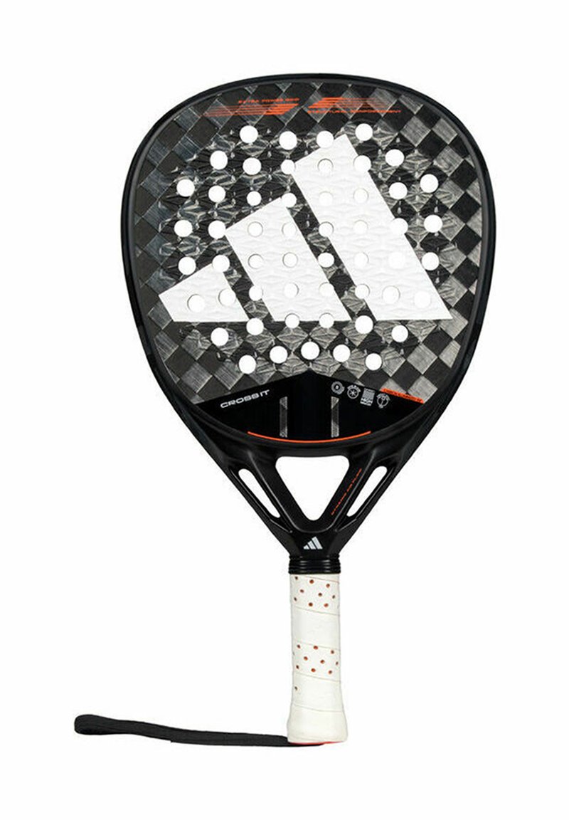 Black paddle with a textured carbon fiber surface, white logo detail, and perforated holes. Grip is white with black accents and a wrist strap.