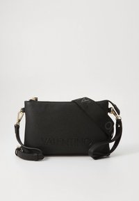 Black leather crossbody bag with a textured surface, embossed logo on the front, detachable strap, and gold-tone hardware accents.