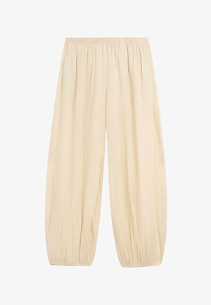 Cremefarbene, locker sitzende Hose mit elastischem Bund und gerafften elastischen Bündchen, aus leichtem Stoff gefertigt.