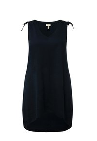 Top senza maniche blu navy con scollatura a V, caratterizzato da dettagli arricciati ai lacci delle spalle e un orlo posteriore più lungo. Tessuto morbido, vestibilità casual.