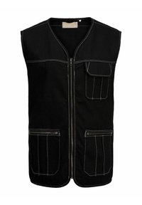 Svart väst med zippered fram, utrustad med två sidfickor med dragkedja och en bröstficka. Tillverkad av tyg med kontrasterande vit sömnad.