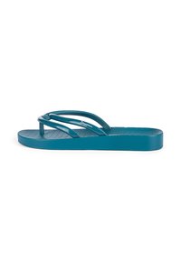 Türkise Gummi-Walkschuhe mit strukturiertem Fußbett und zwei gebogenen Riemen. Verfügt über eine flache Sohle und minimales Branding an der Seite.
