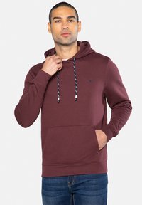 Bordeaux hoodie met een kangoeroezak, trekkoordkap met gestreepte accenten en een klein logo op de borst. Van een katoenmix.
