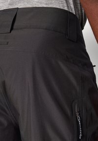 Patagonia INSULATED POWDER TOWN PANTS - Nohavice na snowboard - black