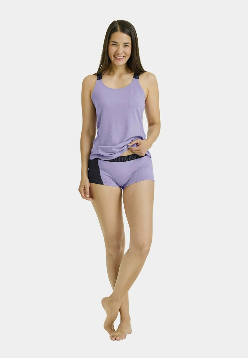 Light purple athletic tank top with black accent straps, paired with matching shorts featuring a black waistband and smooth texture.