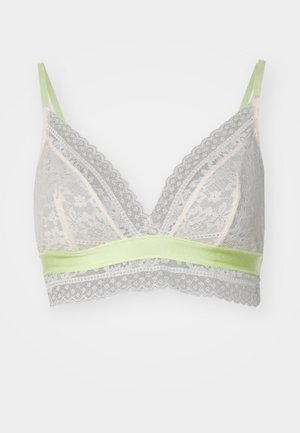 Kanten bralette in lichtgrijs met bloemenpatroon. Voorzien van een zachte groene satijnen band en verstelbare schouderbandjes. Fijne scalloped randen.