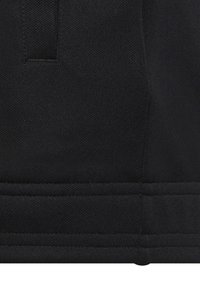 Schwarzes Stoffpanel mit einer strukturierten Webart. Verfügt über genähte horizontale Nähte entlang der unteren Kante. Starkes und langlebiges Material.