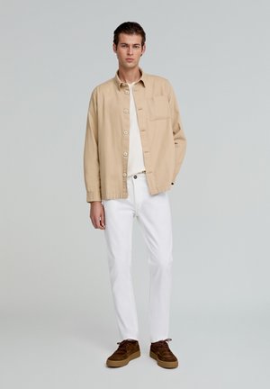 Vaqueros tapered - white