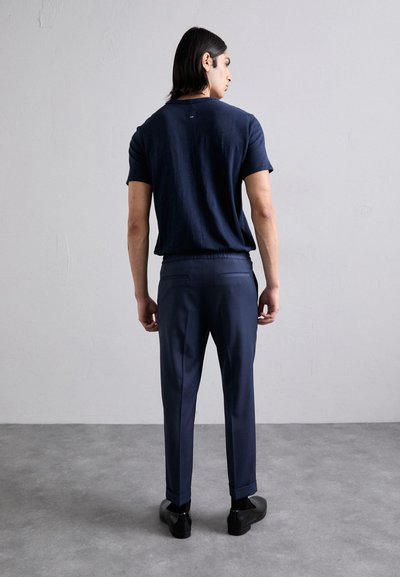 Filippa K TERRY CROPPED TROUSERS - Hlače - dusk blue