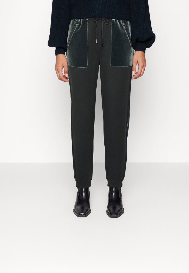 Marks & Spencer Tracksuit bottoms dark green Zalando