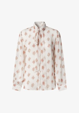 Witte blouse met lange mouwen en een roze bloemenpatroon. Heeft een kraag en een strikdetail bij de hals. Getextureerde stof met knoopsluiting.