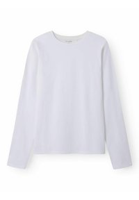 Langarmshirt aus weichem Baumwollstoff in Weiß, mit rundem Ausschnitt, geradem Schnitt und minimalen Nähten für ein klares Design.