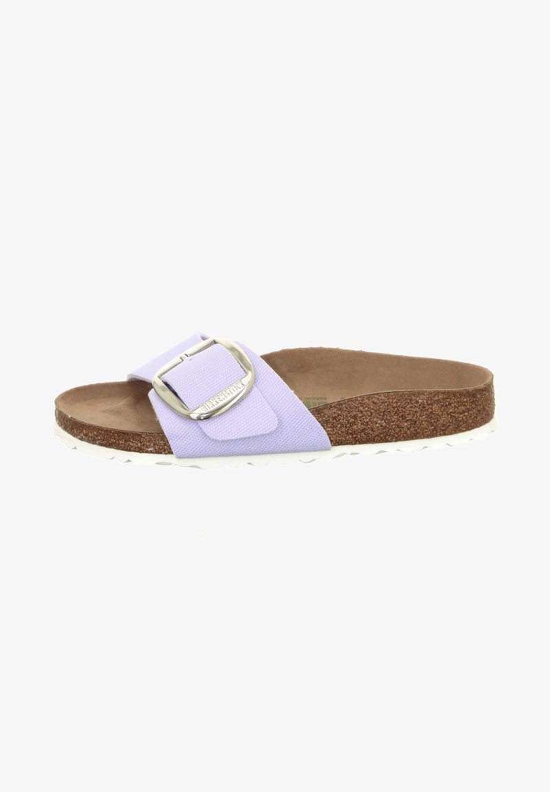 Lilac slide sandal featuring a wide strap with a silver buckle, cork footbed, and textured brown outsole. White rubber bottom for grip.