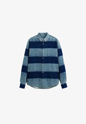 Farmering ing kék és tengerészkék vízszintes csíkokkal, hagyományos gallérral, gombos záródással, hosszú ujjakkal, valamint laza szabással.