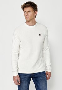 Koroshi Vesta - crudo offwhite