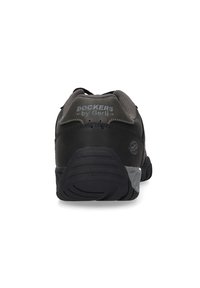 Schwarzer Sneaker mit grauen Akzenten, strukturiertem Fersenbereich, gepolstertem Kragen und Gummisohle. Mit „DOCKERS by Gerli“-Branding auf der Rückseite.