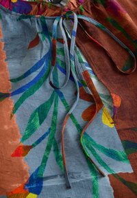 Unselected, blue/brown patched floral print