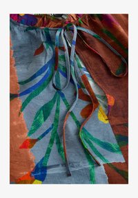 Unselected, blue/brown patched floral print