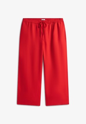 Punased laia säärega püksid elastse vöökohaga ja reguleeritava nööriga. Sile tekstuur ja ühtlane värv ilma nähtavate mustrite või aktsentideta.