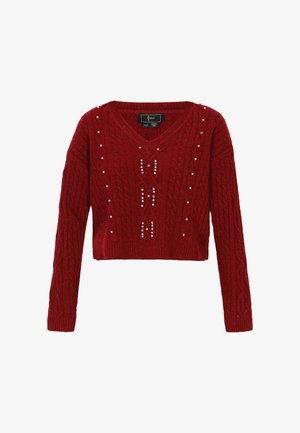 Maglione lavorato a maglia rosso con un design corto, scollo a V e motivo a trecce. Accentuato con perline bianche disposte in un motivo geometrico.