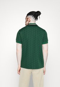 Lacoste Piké - rocket/sinople