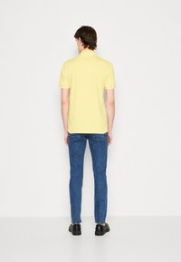 BOSS PASSERTIP - Polo - bright yellow