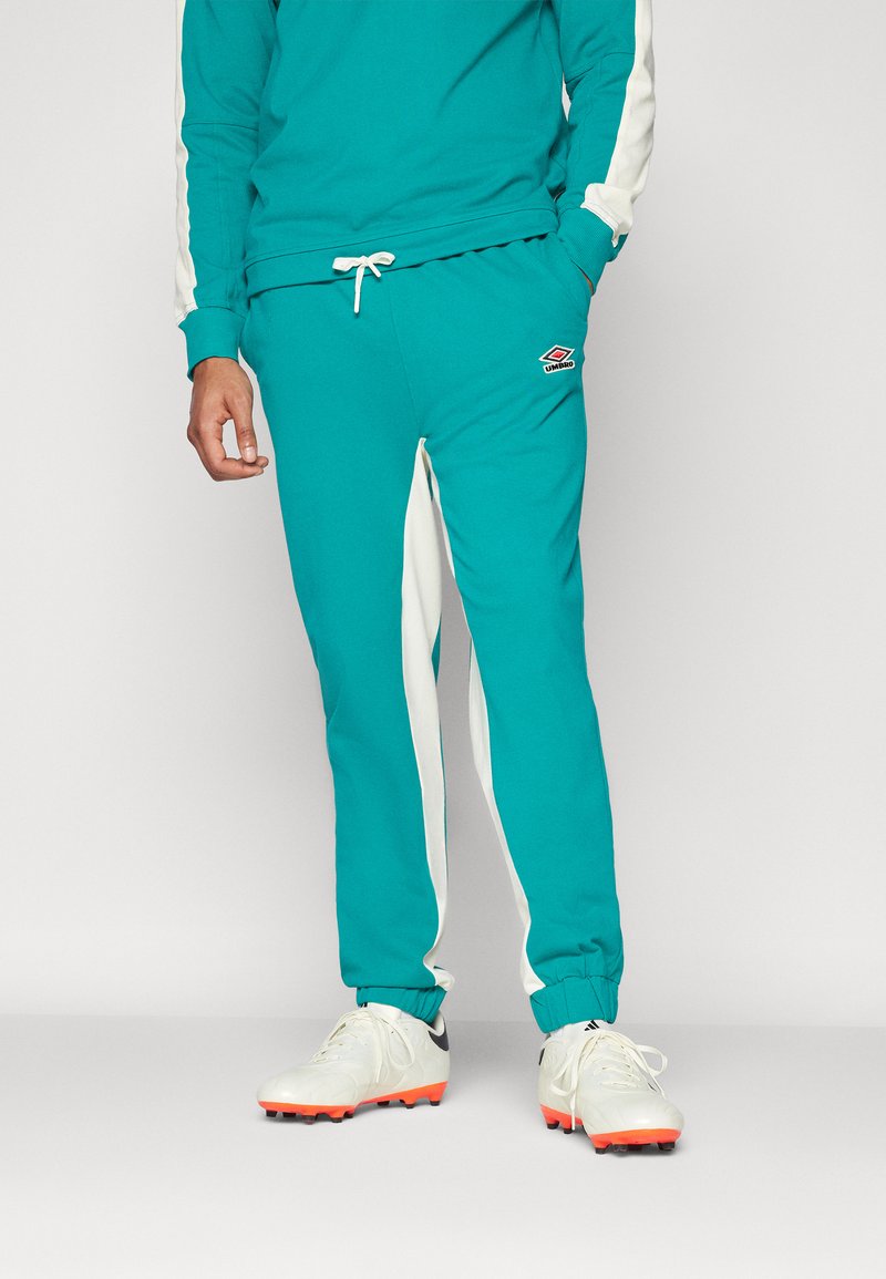 Umbro - RELAXED JOGGER - Donji dijelovi trenirke - quetzal green/papyrus, Povećaj