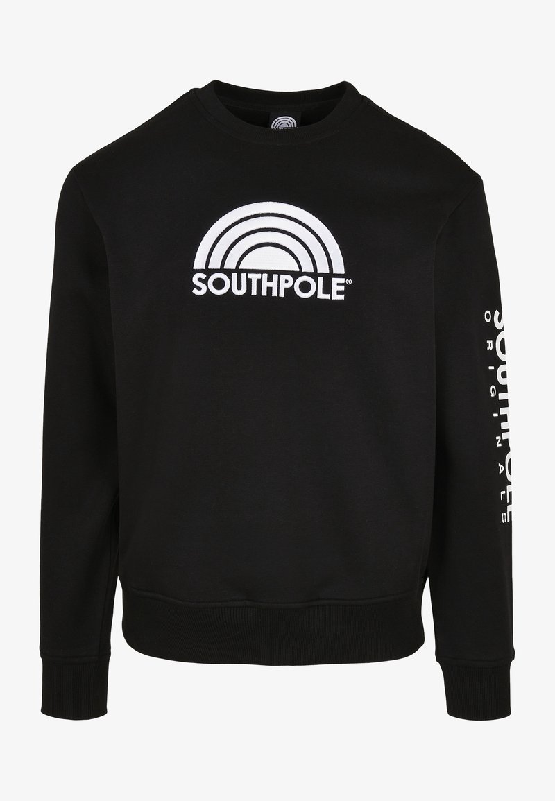 Sweat-shirt noir à manches longues avec logo Southpole blanc et design en arche sur le devant, et texte vertical blanc Southpole Originals sur la manche droite.