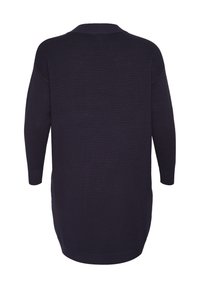 Long, dark navy sweater with a ribbed texture, wide sleeves, and a high-low hem, featuring a crew neckline and a relaxed fit.