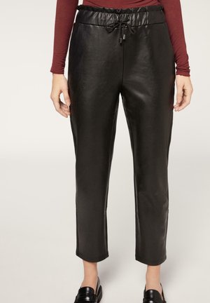 Spodnie materiałowe