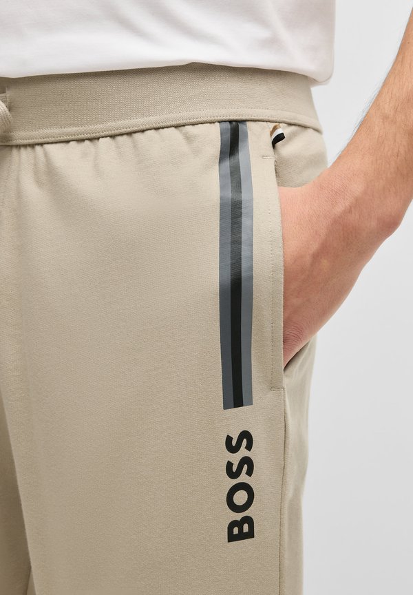 AUTHENTIC - Tracksuit bottoms - light beige4