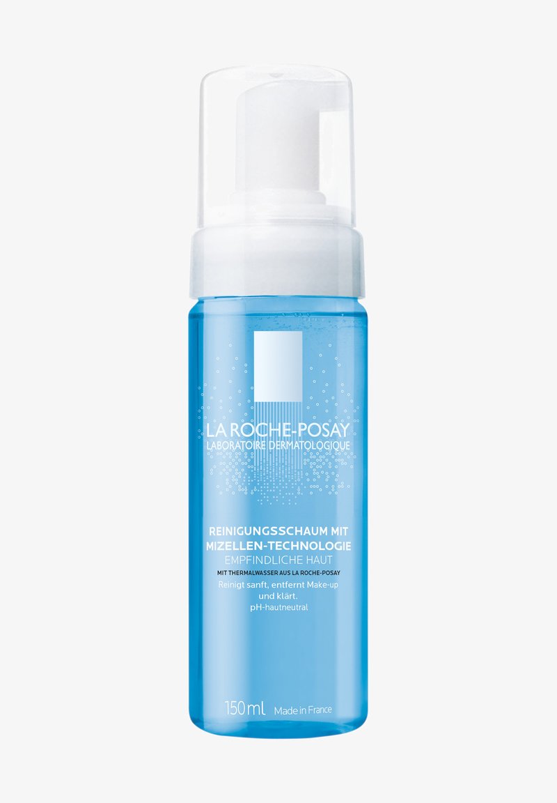 Foaming cleanser in a transparent blue bottle with a white pump. Features simple branding and text, with a volume of 150ml.