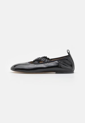 Black patent leather flat shoe with a pointed toe, gathered fabric accent at center, and a small heel, featuring a sleek, glossy finish.