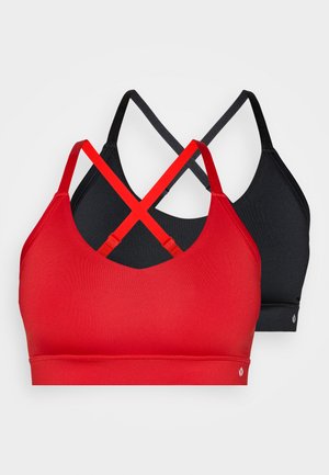 Brassières de sport rouges et noires avec une texture lisse et des bretelles croisées dans le dos, présentant un col en V et une conception sans coutures.