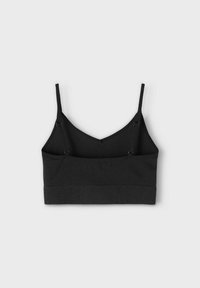 Svart ribbad bralette med justerbara band och V-ringad design. Slät textur och bred band i botten för stöd.