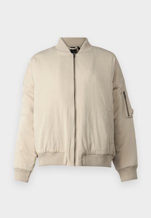 Beige bomber jacket with ribbed collar and cuffs, front zip closure, side pockets, and a small zippered pocket on the sleeve. Smooth texture.