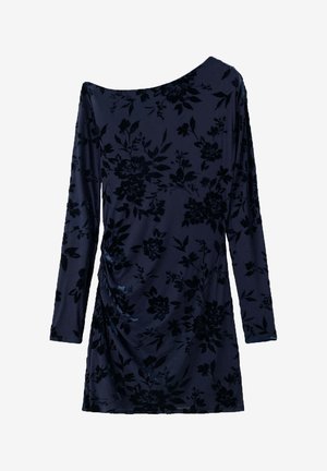 Robe bleu foncé à manches longues avec motif floral en velours noir et léger froncé latéral sur un fond uni.