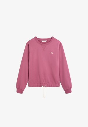 Sudadera de manga larga en rosa polvo con puños acanalados, dobladillo con cordón ajustable, cuello redondo y pequeño logo blanco de calavera y huesos cruzados en el pecho.
