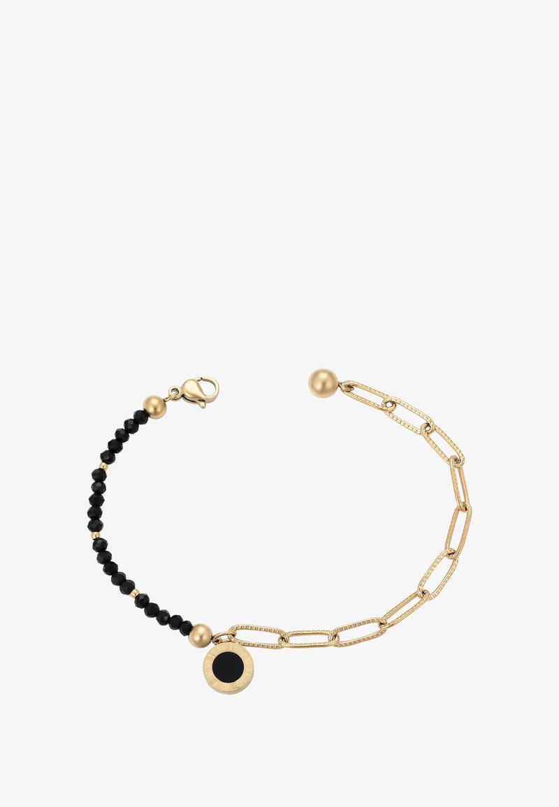 Arany karkötő, amely váltakozó fekete gyöngyöket és láncszempárokat tartalmaz, egy kerek fekete és arany charm-mal, és homárkapoccsal záródik.