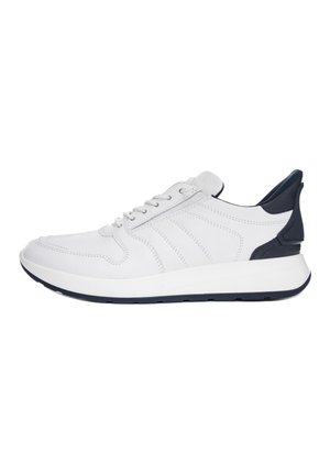 White leather sneaker with navy heel accent, white laces, thick white sole, and side stitching details, shown in side profile.