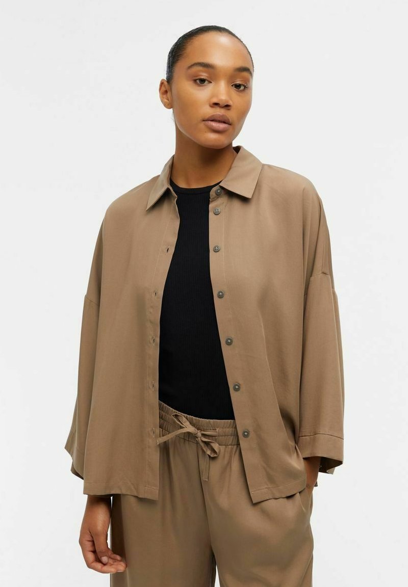 Object Blusa - fossil