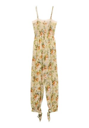 Floral jumpsuit with thin straps, light beige background, orange and green floral pattern, gathered waist, and tie cuffs at the ankles.